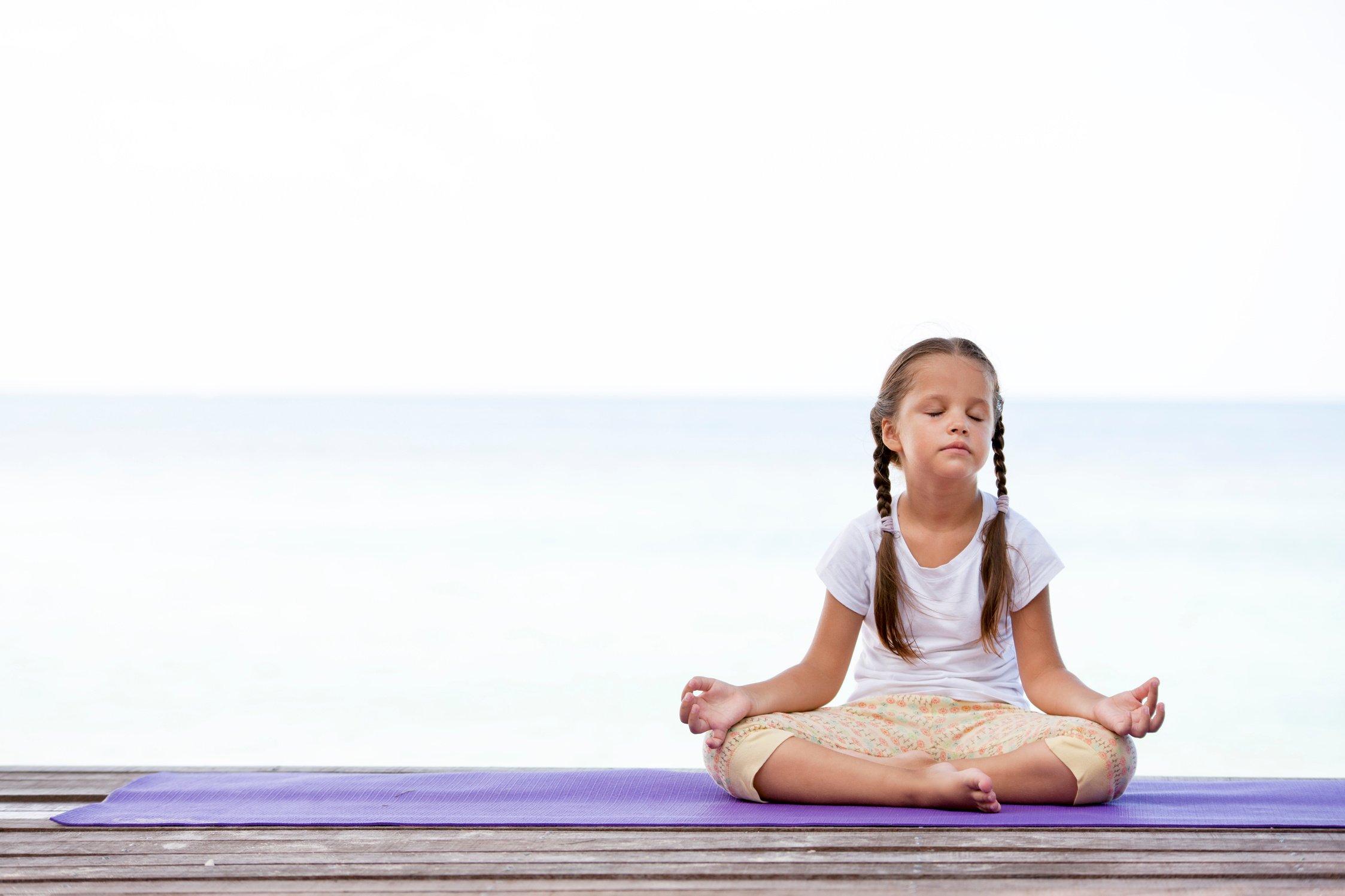 Young Girl Doing a Yoga Pose